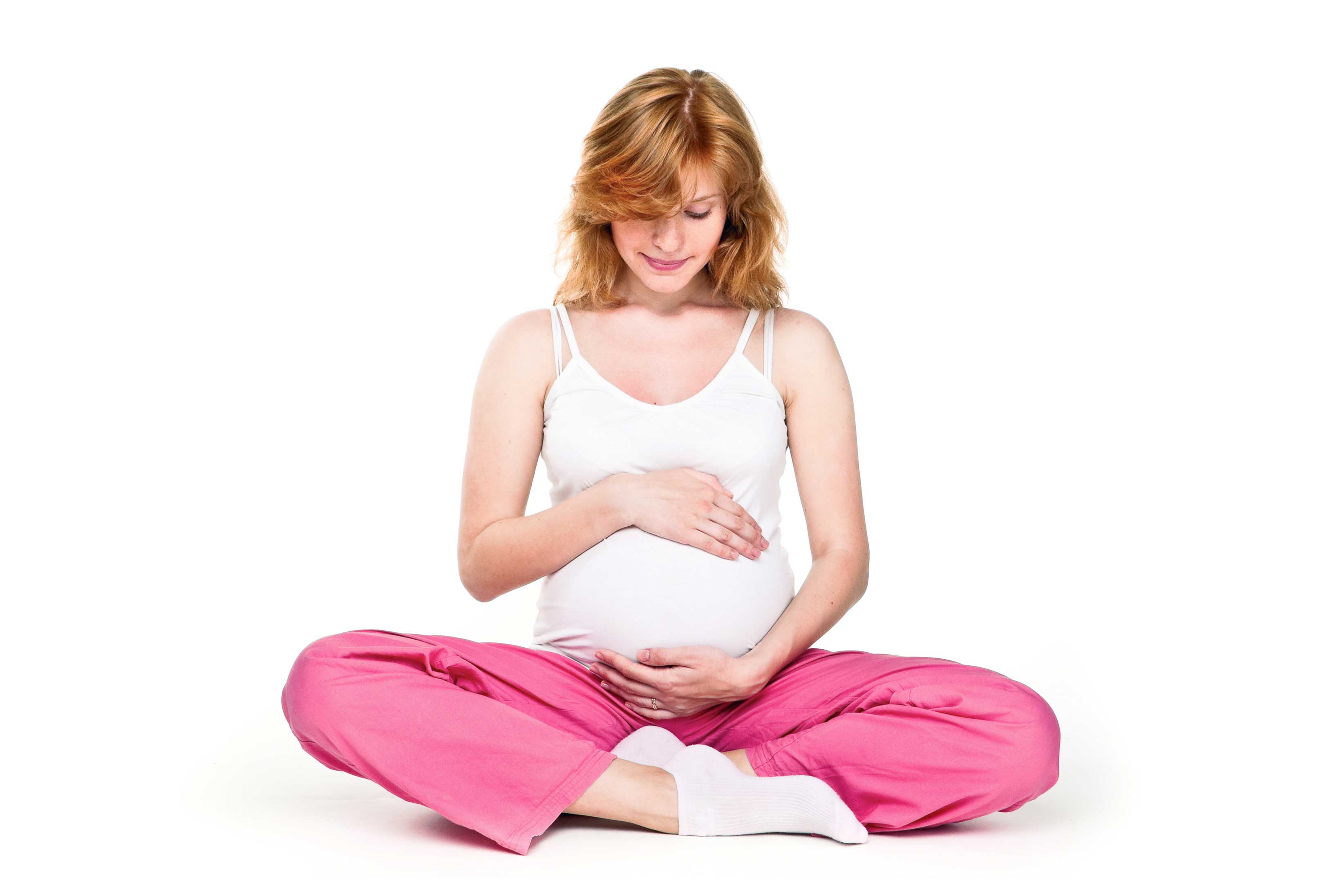 Беременная женщина сидит